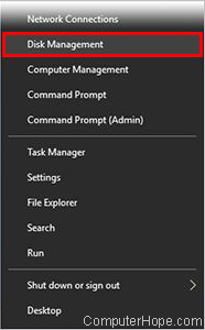 Open the Power User Tasks Menu by pressing Win + X, and select Disk Management.