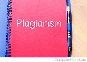 Red notebook with the word Plagiarism on the front cover.